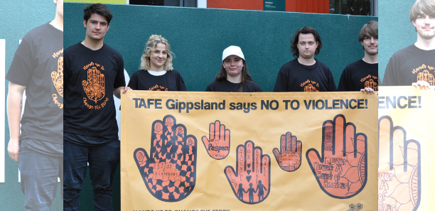 Students showing off thier banner