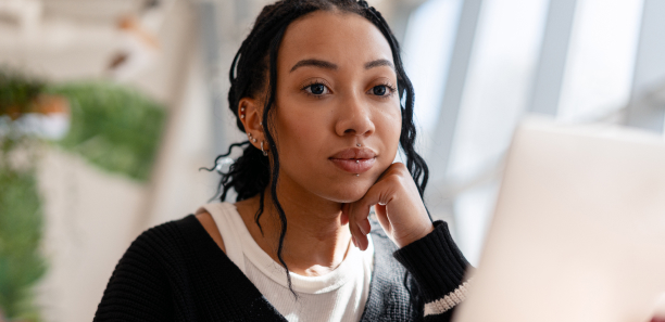 woman studying on a laptop
