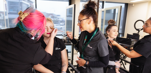 Alarna Bell teaching makeup students at TAFE