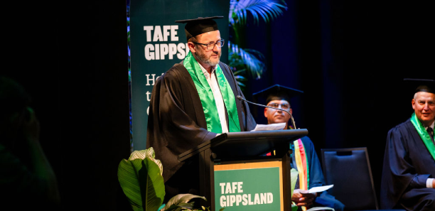 TAFE Gippsland CEO James Montgomery addresses the audience at graduation