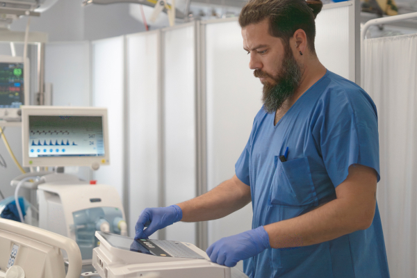 hospital staff operating machine