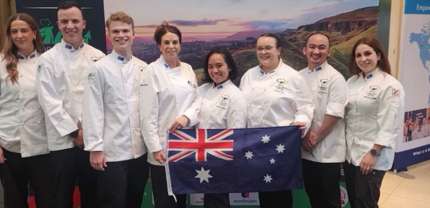 Jess (left) with fellow 'Team Aussie' apprentices flying the flag in Wales.