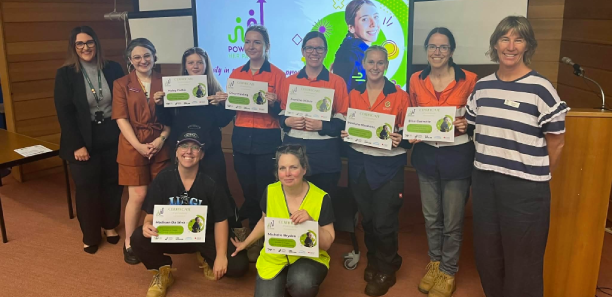 Leah Vicino and Rachel Sands with graduating PHP students