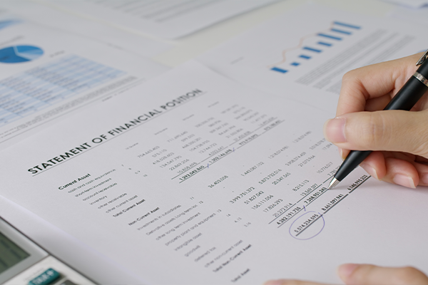 Bookkeeper working on financial statement