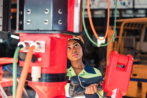 Electrician inspecting machine