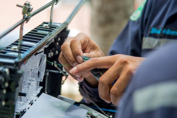 Electrician repairing wire
