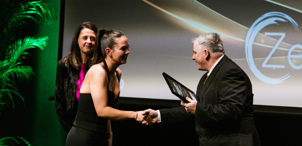 Amber Leyshan collecting her award