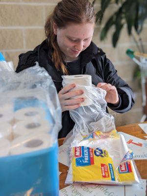 Student working at the Morwell Neighbourhood House Foodbank