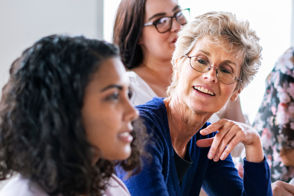 classroom of students discussing their studies
