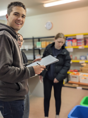Andre working at the Morwell Neighbourhood House Foodbank