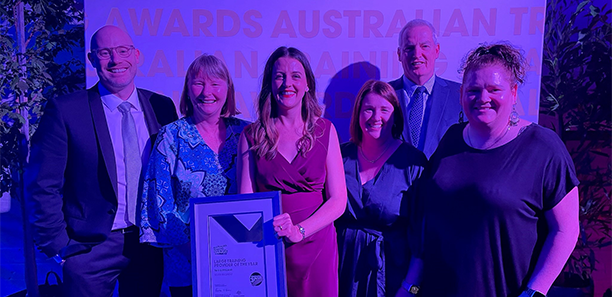 TAFE Gippsland CEO Laura Macpherson (centre, holding award), with (from left) Director Student Experience Justin Fallu, Education Admin Gretel West, Director Education Delivery Linda Austin, TAFE Gippsland Board Chair Paul Buckley and Head of Department Transition Kristine Walsh.