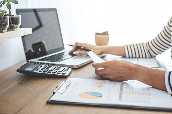 bookkeeper recording invoice